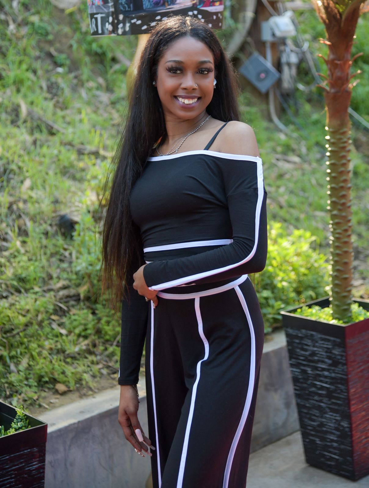 A SC House Hollywood cast member arrives on the red carpet outside the Hollywood Hills mansion