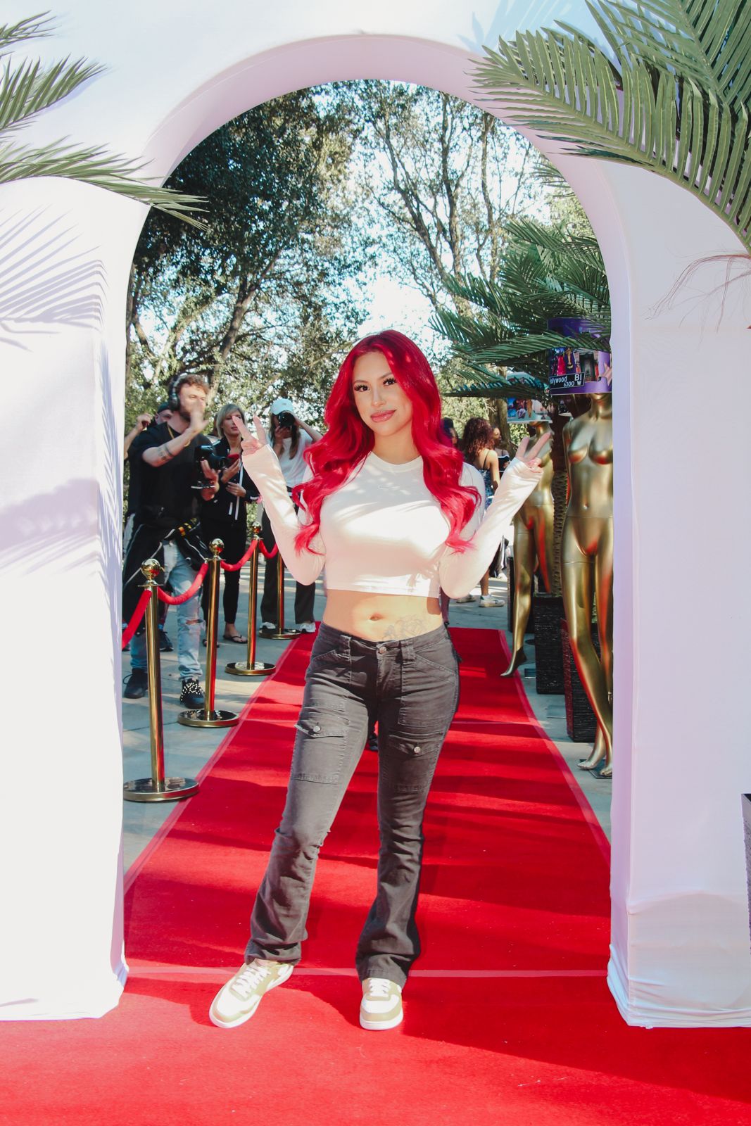 A SC House Hollywood cast member arrives on the red carpet outside the Hollywood Hills mansion