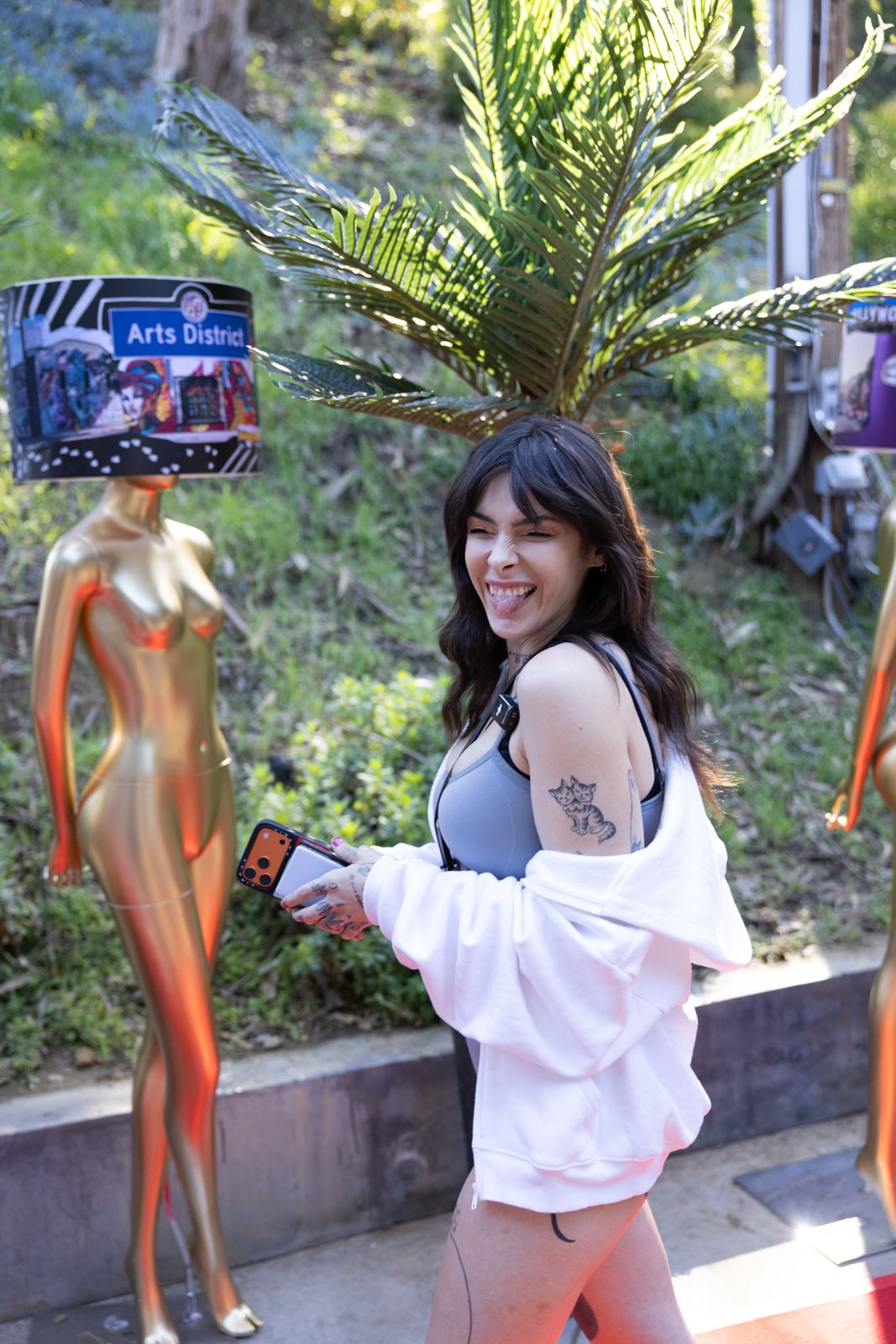 A SC House Hollywood cast member arrives on the red carpet outside the Hollywood Hills mansion