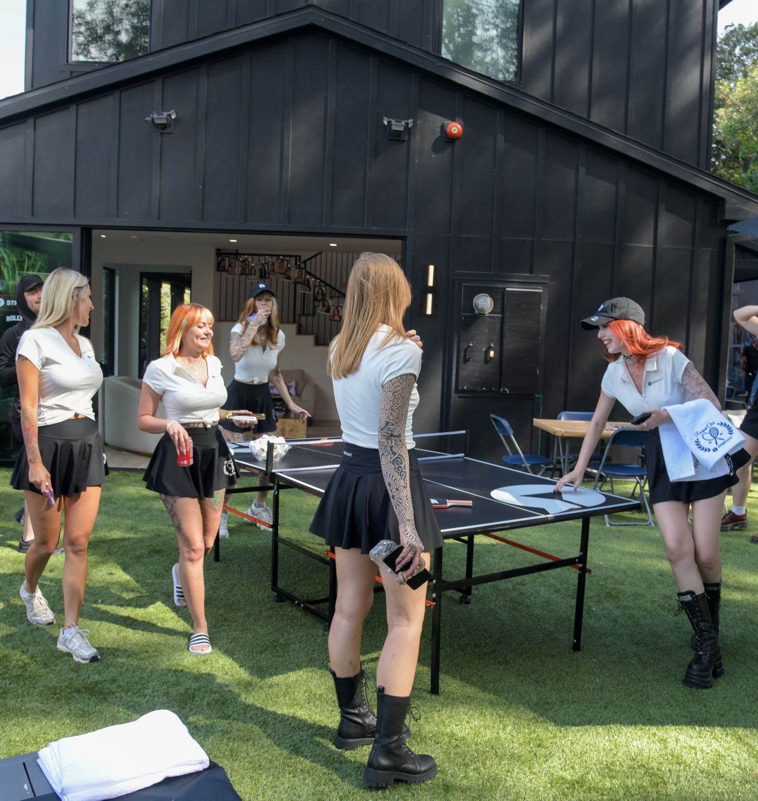 Cast members relaxing around the SC House Hollywood mansion between shoots