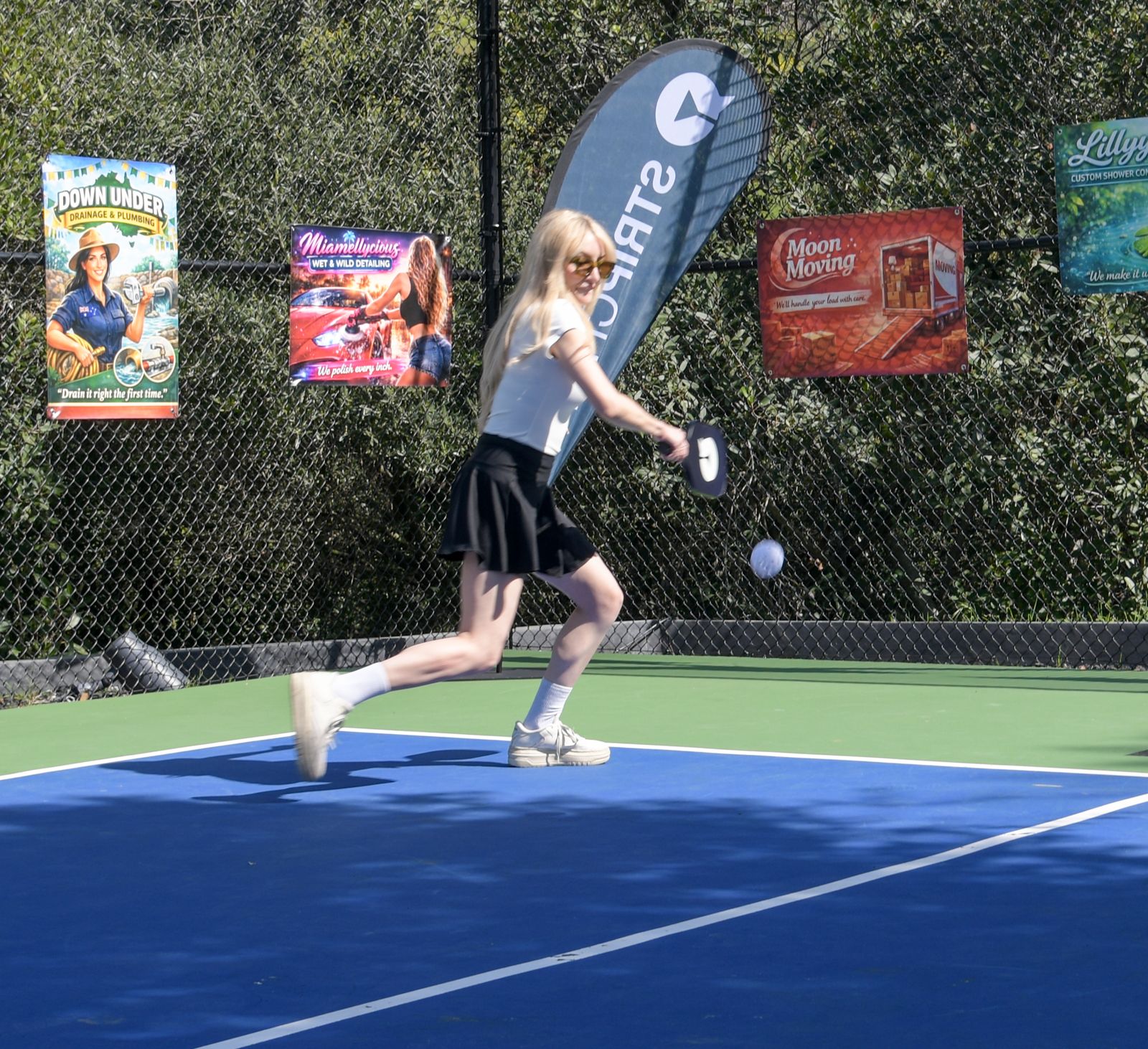The SC House pickleball tournament in racquet-club uniforms on the private Hollywood Hills court