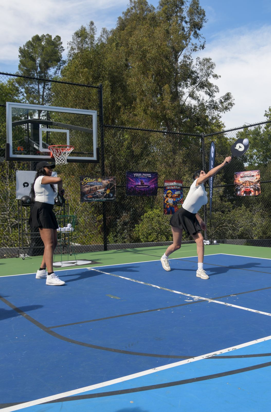 The SC House pickleball tournament in racquet-club uniforms on the private Hollywood Hills court
