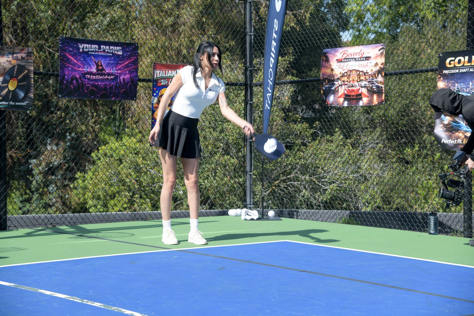 The SC House pickleball tournament in racquet-club uniforms on the private Hollywood Hills court