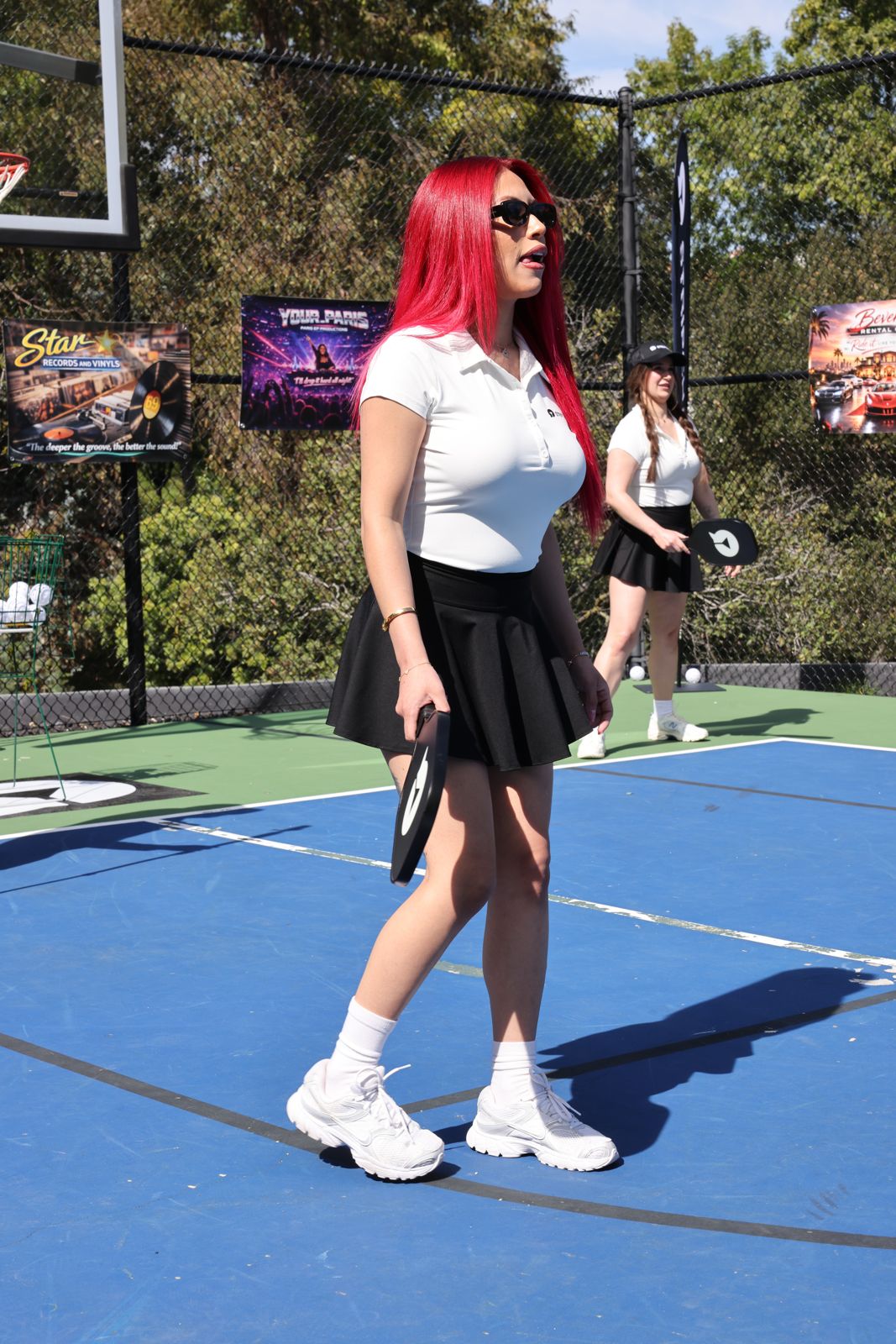 The SC House pickleball tournament in racquet-club uniforms on the private Hollywood Hills court