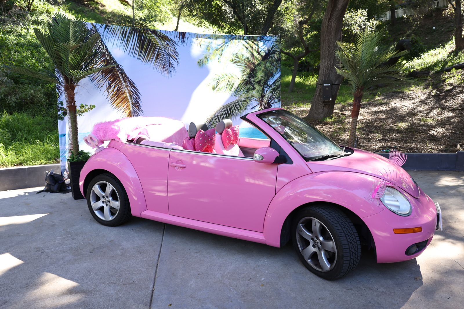 The pink Volkswagen Beetle from the Barbie shoot parked outside the SC House Hollywood